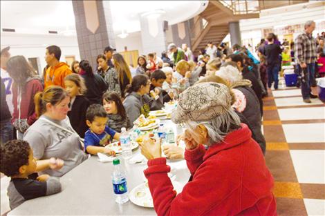 Turkey is on the menu for more than 900 people who gather to share a meal during the powwow celebration.