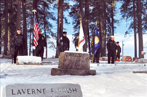 Laverne Parrish is honored on Veterans Day near his headstone in Ronan.