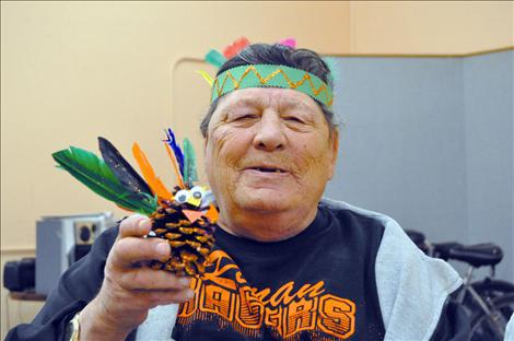 Mission Mountain Enterprises resident Patrick Campbell shows off a turkey that students from Kicking Horse Job Corps created. 