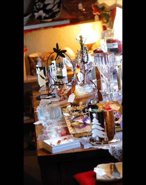 Vintage glassware and other items sparkle in the light.