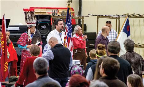 Worshipers gather at Two Eagle River School for turkey.