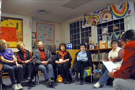 A group of Ronan citizens recall times past at a Ronan Library gathering.