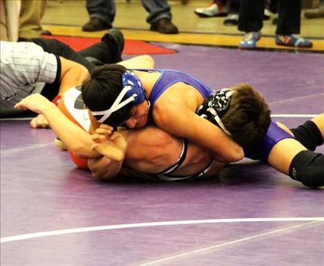 Bulldog Gregory Weatherwax pins opponent. 