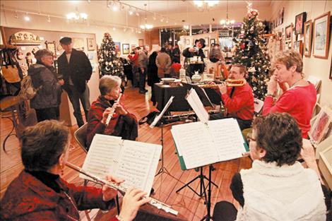  The Flathead Flute Choir entertains  in the Sandpiper Gallery.