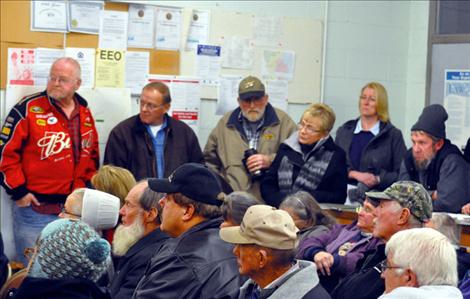 St. Ignatius residents listen to proposed airport regulations. 