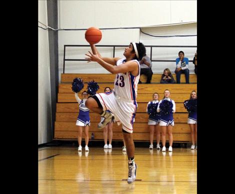 Bulldog Gentry Brown comes in for a layup.