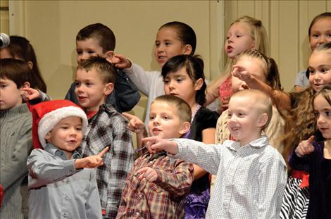 Arlee elementary students sing "We want to wish 'you' a Merry Christmas.”