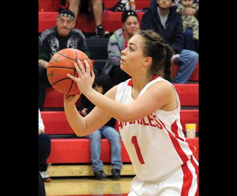 Lady Eagle Casadi Wunderlich prepares to fire a free throw in Saturday’s game against Hot Springs. Wunderlich has proved to be a point leader for the Lady Eagles.