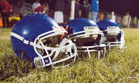 Bulldog-blue helmets get a break at halftime.
