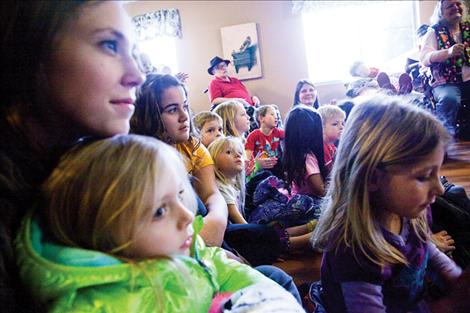 Families gathers in the Polson Health and Rehabilitation dining hall to watch their parents and grandparents perform.