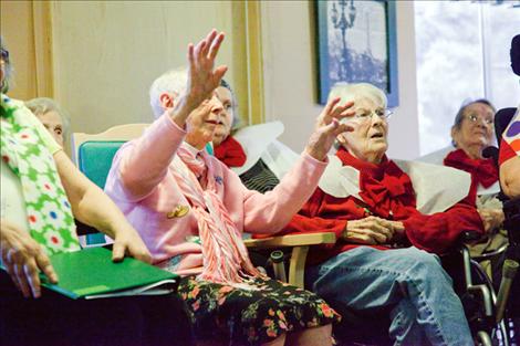 Residents of Polson Health and Rehabilitation sing “Silent Night” during a presentation of the original play, “A Christmas Wish.”