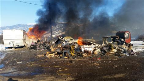 The fire spread quickly throughout Val Dillard’s mobile home,causing her family to lose everything.