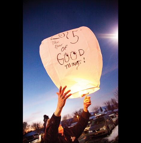 Wishes are written on lanterns and sent into the cerulean sky.