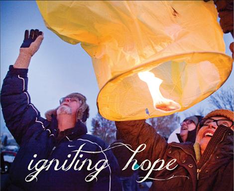 Nicole Tavenner/Valley Journal People gathered in Polson on New Year’s Eve to send their hopes and wishes for 2015 floating upward in the night sky.