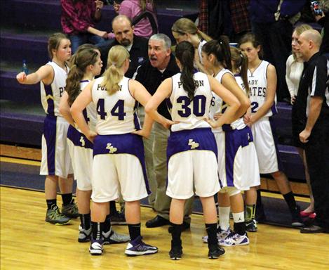  Coach Jay Krantz discusses attack plans during a fourth quarter timeout.