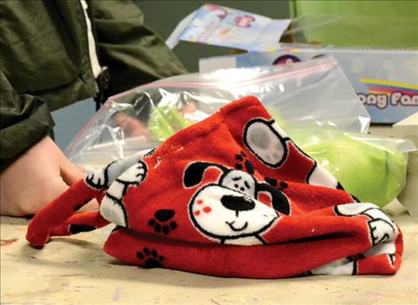 Cozy fleece bags were handmade by 4-H girls for children who, for safety reasons, need to be removed from their homes by protective services.