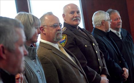 Lake County elected officials stand to be sworn-in.