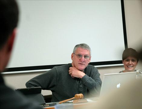 John Triolo, Polson school board chair, discusses the quality schools planning grant with PHS Principal Rex Weltz.