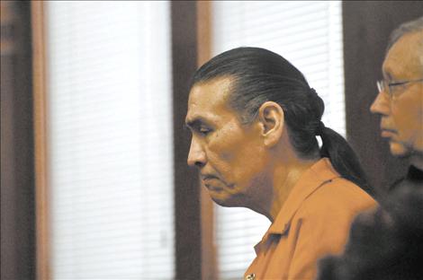 Harry Lozeau changes his plea to guilty Wednesday, Jan. 21 in Lake County district court. Lozeau was charged with deliberate homicide in the shooting death of his brother, Terry.