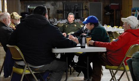 Montana Highway Patrol Sergeant Rich Salois attends a Neighborhood Watch meeting in St. Ignatius. 