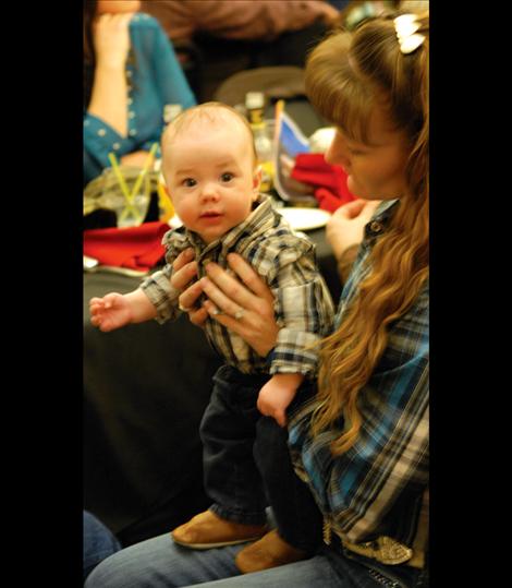 Roper McCollum, 4 months old, is one of the younger stockgrowers at the WMSA winter meeting.