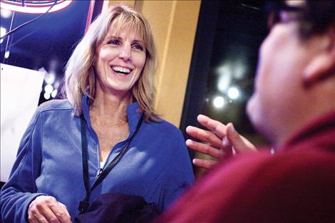 Darlis Smith jokes with Rich Peterson of Poplar at the Afterhours Party during the third annual Flathead Lake International Cinemafest held in Polson.