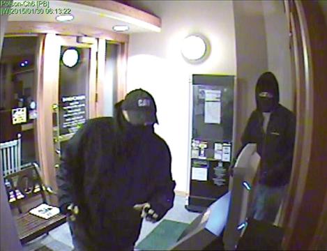 Security  video from Community Bank shows two men removing the automatic teller  machine from the bank’s lobby at approximately 6 a.m. Friday.