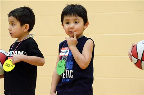 A participant contemplates a drill. 