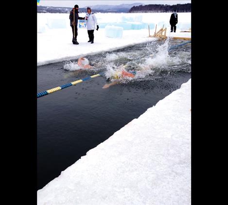 Mark Johnston races in a 25-meter  lane carved out of  a frozen lake  in Vermont.