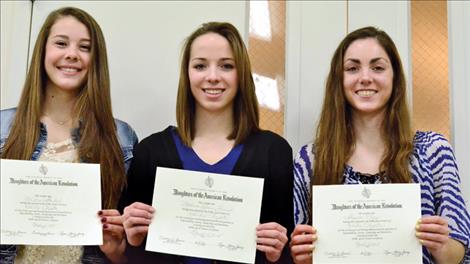 Winners of the Kuilix chapter of the Daughters of the American Revolution scholarship contest include, from left, Kendra Starkel, 18, Ronan, first place; Madison Foust, 17, from Charlo, second place; and Shayna Nagy, 18, of Charlo, third place