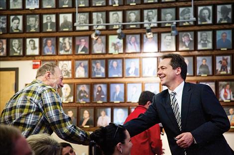 Governor Steve Bullock greets people attending Friday’s meeting at CSKT headquarters in Pablo.