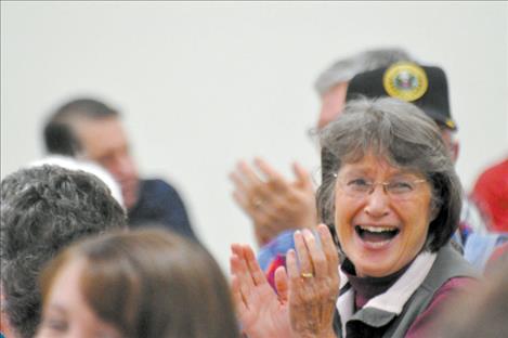 Daphne Hofschulte laughs at a joke delivered by Barry Baker. 