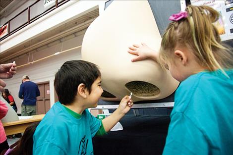 Students sport eye protection for one of the science demonstrations.