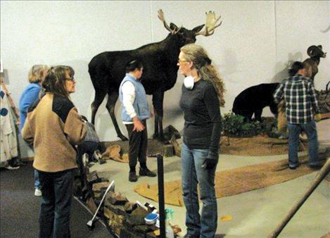 Donna Cheff, Pat Jamieson, Martha Stammers and Jo Cheff spruce up the Ninepipes Museum.