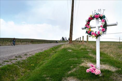 A memorial was set up where Jami Sherman died on Leighton Road in July 2006. More than 700 people attended her funeral at Ronan High School.