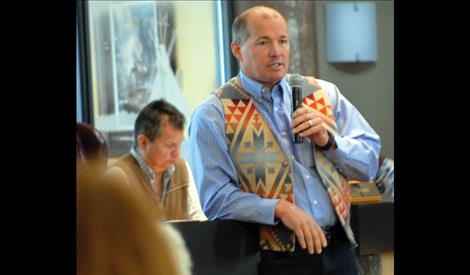 Brian Lipscomb, president and CEO of Energy Keepers, Inc., speaks to tribal membership at the quarterly meeting.