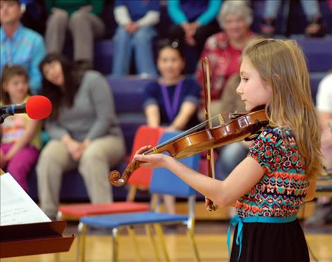 Adison Carlson plays her violin in the Linderman Elementary School Talent Show. 