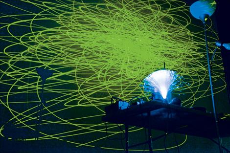 A laser light show set to pop tunes transformed the Ronan Performing art center.