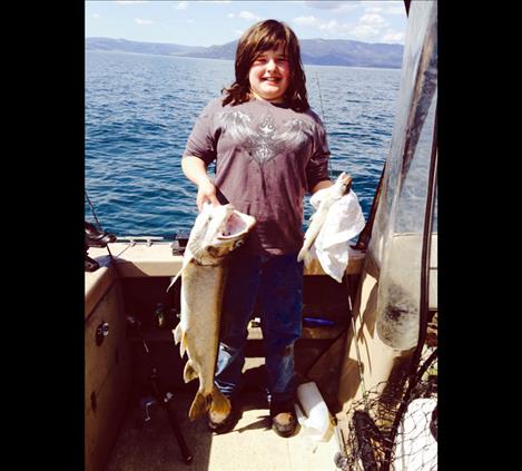 Abby Hodgson displays her catch in the Spring Mack Days competition. 