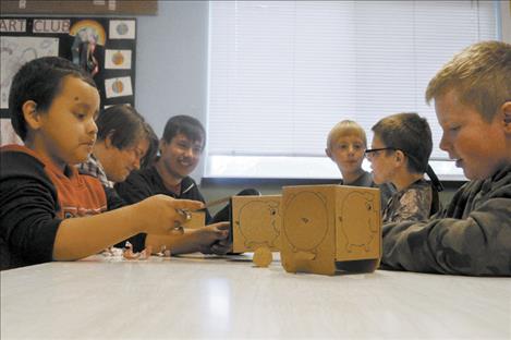 First Interstate Bank Staff gave piggy banks and personal finance lessons to students at the Polson and Ronan Boys and Girls Club to encourage good financial health. 