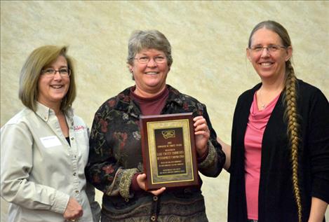 Debbie Vassar, Lake County Job Service Employer Committee chair and Debra Krantz, Lake County Job Services manager in Polson, present “Employers of Choice” awards at their spring workshop to Jan Tusick, small business award for Lake County Community Development.