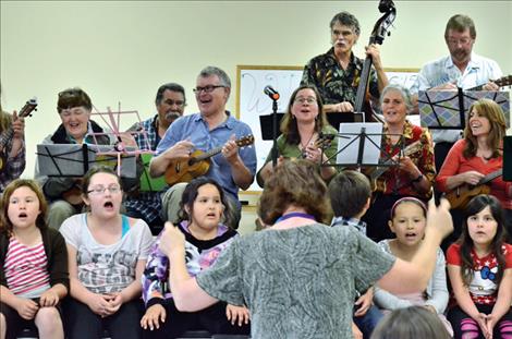 Karen Peterson photo Mission Valley Uke Jammers play along with St. Ignatius students. 