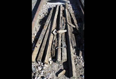 Rotting wooden railroad ties await the trash heap.