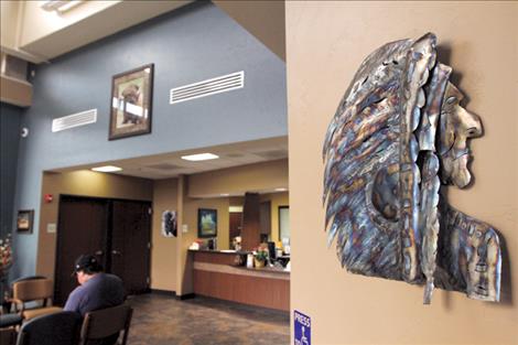 A Native American-inspired sculpture greets patients at Polson Health, where local artists’ work adds a personal touch to the decor.