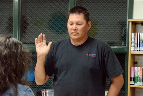Rick Desjarlais takes oath of office for Arlee School Board.  