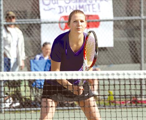 Taylor Rost squares off at the net earlier this season. Rost and doubles partner Shawna Lenz finished third in the Divisional tournament last week.