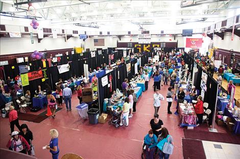 Women pack the floor of Salish Kootenai College gymnasium for the Women 4 Wellness health fair.