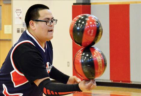 Jerrickson Hosteen shares his basketball skills and a positive message. 