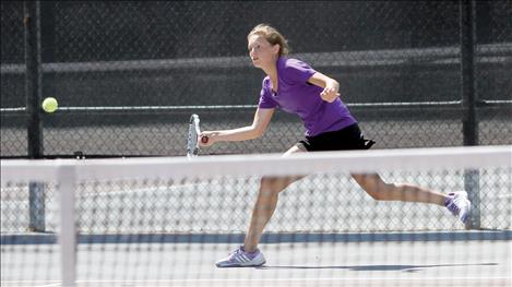 Polson’s Marlee Congdon stretches for the ball during her match with Columbia Falls netter Emily Getts, who managed the win 2-6, 6-0, 6-0.