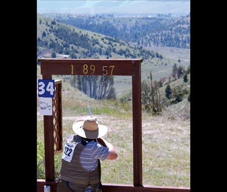 Shooter J.D. Owen, Coeur d’Alene, Idaho, calls for a bird. 